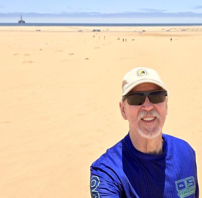 Bill left most of the group behind while he climbed a sand dune in the Namib Desert.jpg
