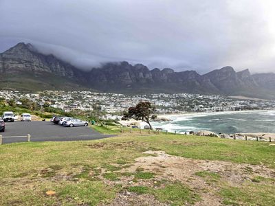 View of Camp's Bay neighborhood and 12 apostles mountain range in Cape Town, South Africa.jpg