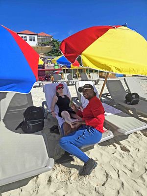 Barbara getting a fresh Aloe massage on Great Bay Beach, St. Maarten