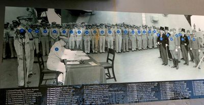 Photo of the signing of the the Formal Japanese Surrender aboard the USS Missouri on September 2, 1945
