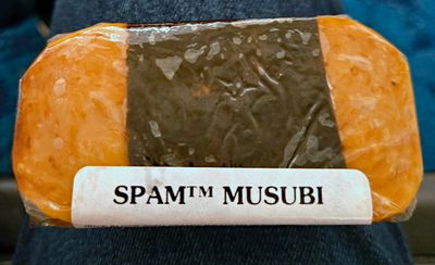 Spam musubi is a popular snack and lunch food in Hawaii that combines a slice of grilled Spam with rice and seaweed