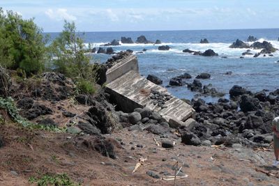Remains of a lighthouse destroyed by a 1946 tsunami with 56 feet high waves moving 490 mph that killed 156 people