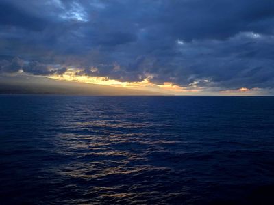 Sailing away from Hilo, HI at sunset