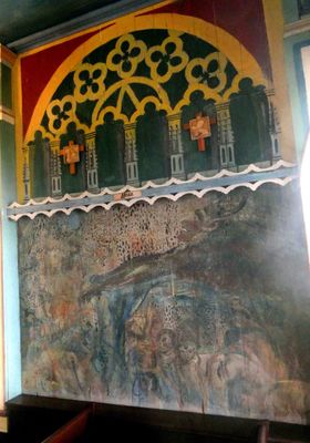 This painting of Hell is the only one in poor condition due to heat from the sun on this part of the church