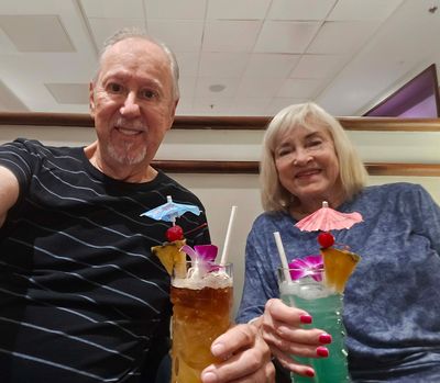 Umbrella drinksin Delta Sky Club waiting to board our flight home!