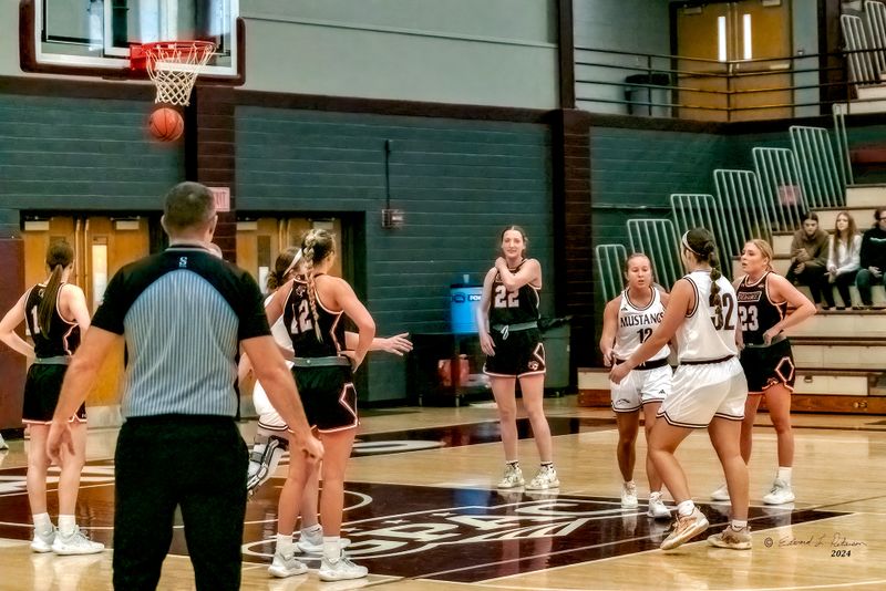 Her first point of the game! And the first fowl shot of the game! I never could get a ball to go in the basket. Well she is making up for my lack of skill. Good game.