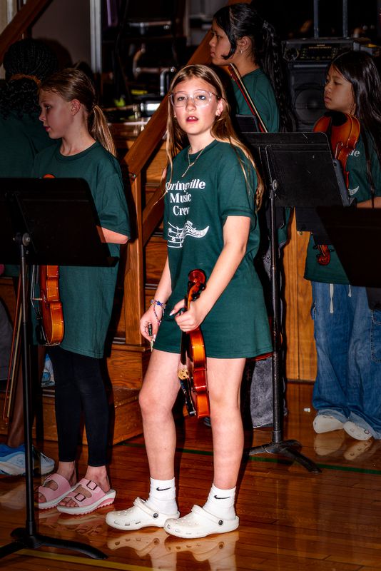 Wrapping up the school with a concert starting off with the violins.