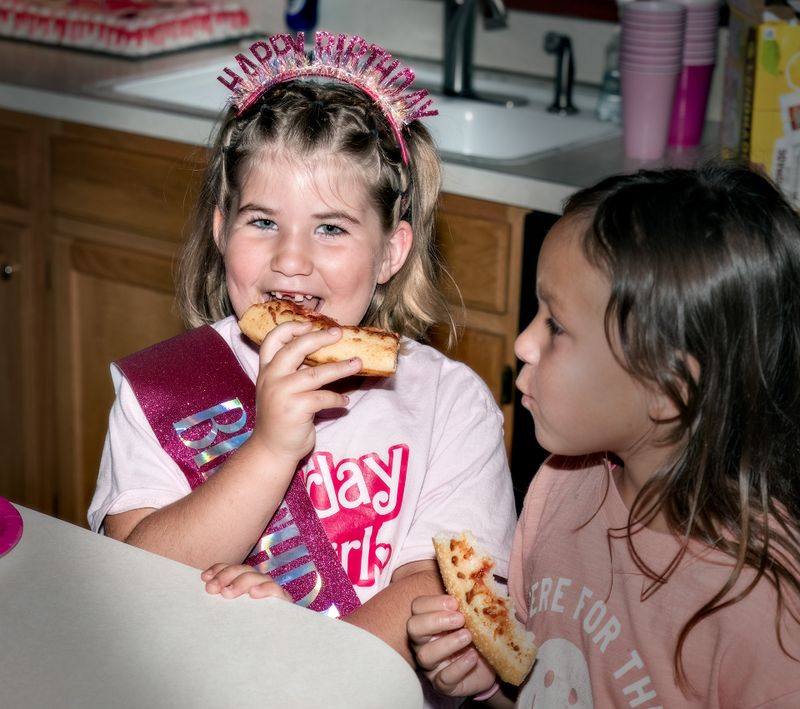 Eating pizza and then to the pool for the celebration!