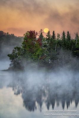 Setting full moon, fog and morning mist at a lake 4