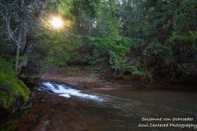 At Siskiwit river with sun burst