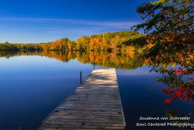 Fall colors reflecting in a lake near Drummond, WI