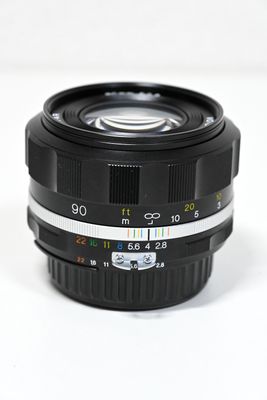257g, filter size = 52mm, MFD = 0.9m