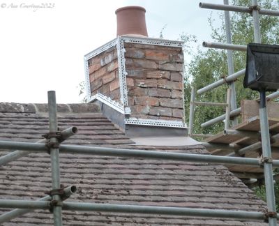 Leadwork round chimney