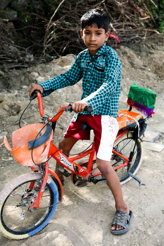 Boy on Bicycle, Tordi Garh, India
