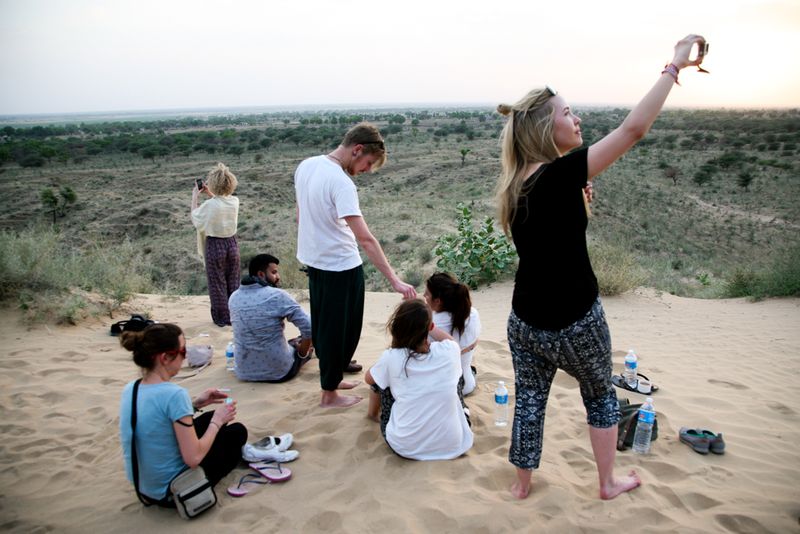 Backpackers at Sunset near Tordi Garh, India