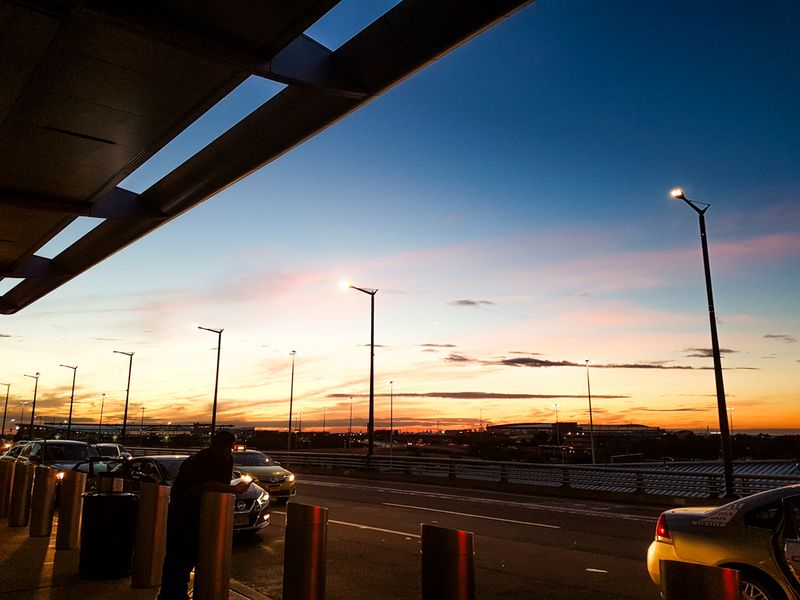 Sunset at Departures, New York City, USA