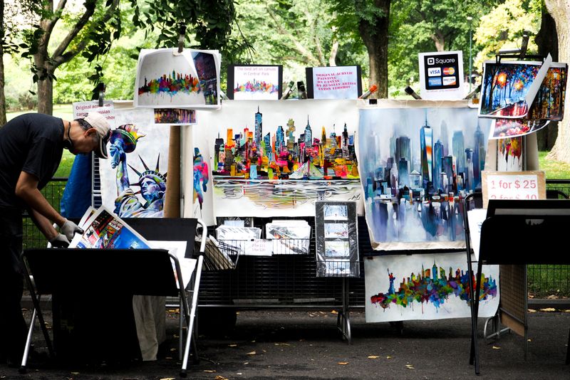 His Art of the City in the Shade of the Trees, Central Park, New York City, USA