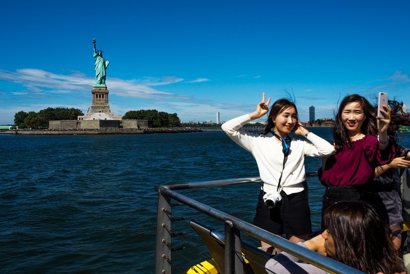 Photographs with Liberty, New York, USA