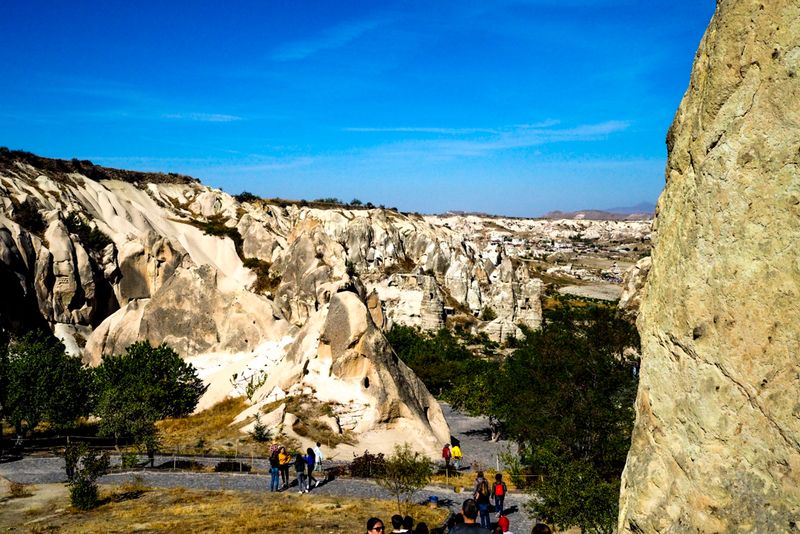 Visitors to a Landscape of Rock, Paşabağ Valley, Cappadocia, Turkey