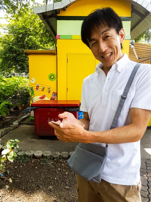 Playing Pokemon in Lumphini Park, Bangkok, Thailand