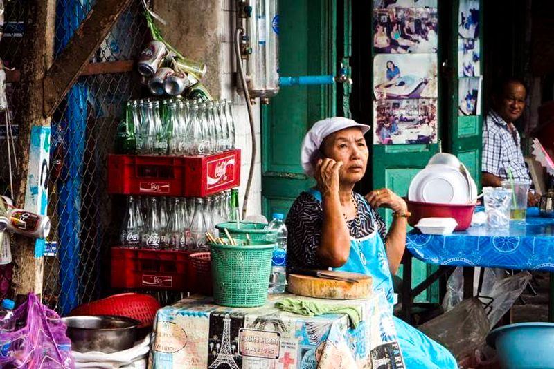 Street Food Seller Chatting, Bangkok, Thailand