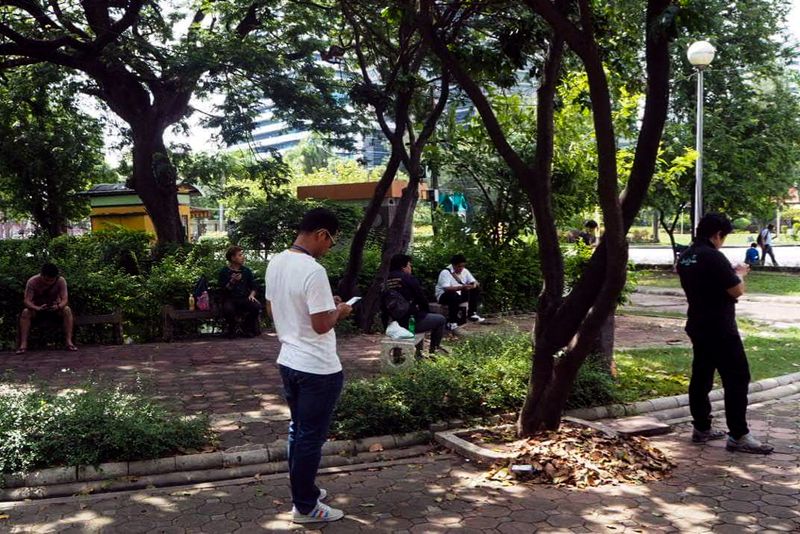 Pokemon Players in Lumphini Park, Bangkok, Thailand
