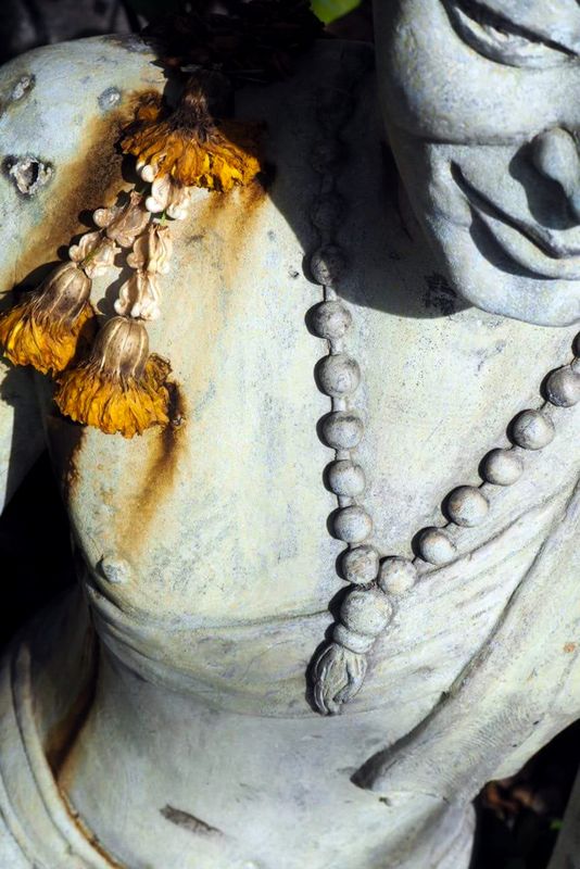 With Marigolds Over His Shoulder, Wat Pho, Bangkok, Thailand