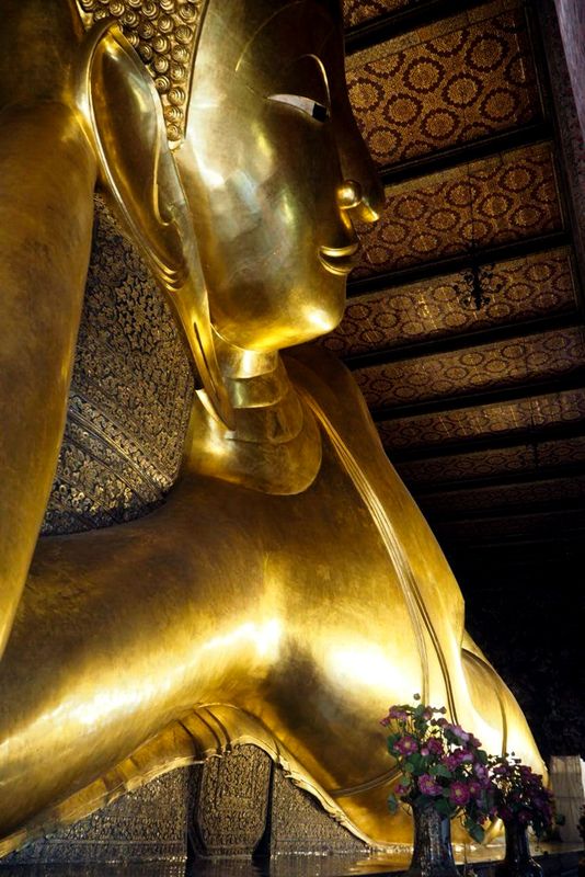 Reclining Buddha and the Flowers, Wat Pho, Bangkok, Thailand