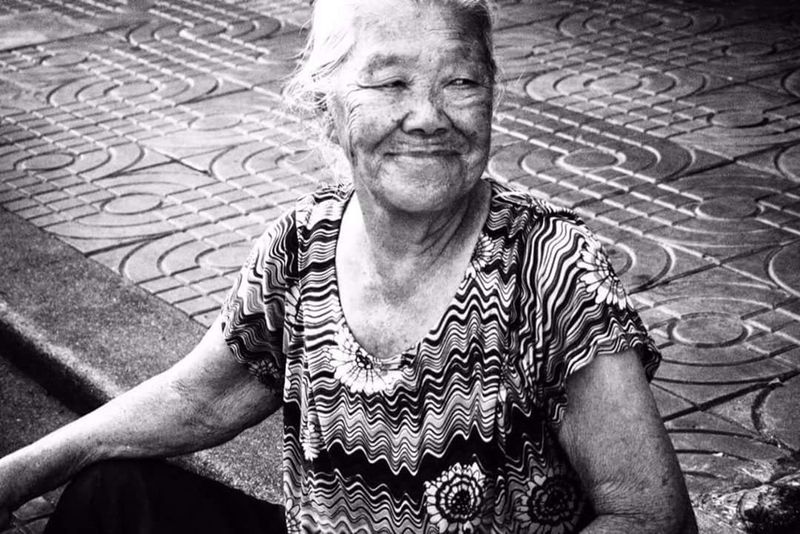 On the Step She Sits Smiling, Bangkok, Thailand