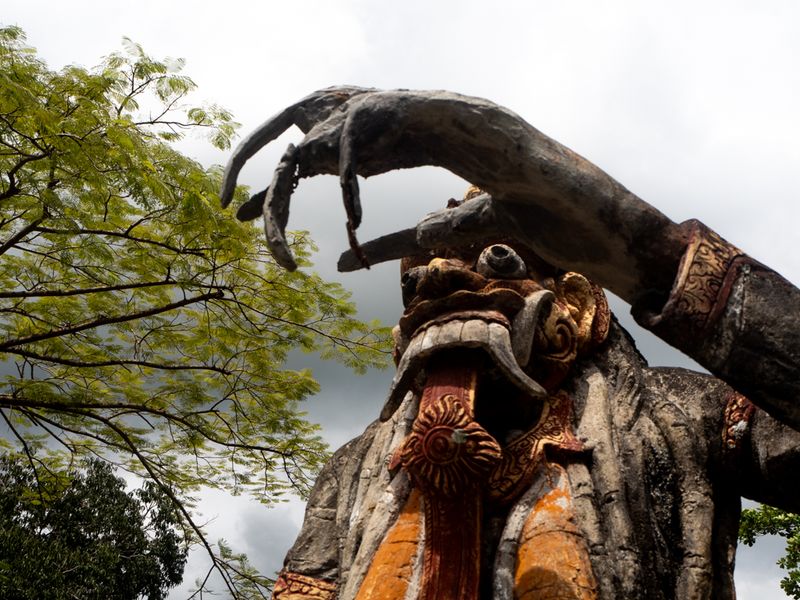 The Hand of a Statue and Trees Above, Tirta Gangga, Bali, Indonesia
