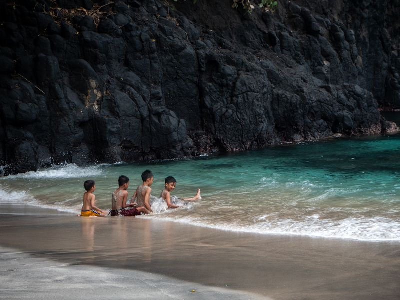 Kids on the Beach at Candidasa, Bali, Indonesia