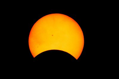 2024 Solar eclipse, at its peak about 24% coverage. Even with clouds I still got this shot.