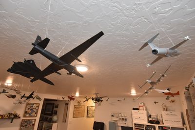 My basement - My collection of airplane models hanging from the ceiling 