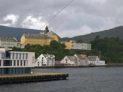 Old and new buildings near the harbour of lesund