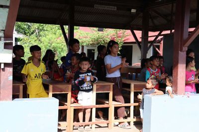 SCHOOL CHILDREN SING THE NATIONAL ANTHEM TO US