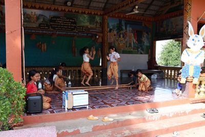 CHILDREN LEARNING TRADITIONAL MUSIC AND DANCES.