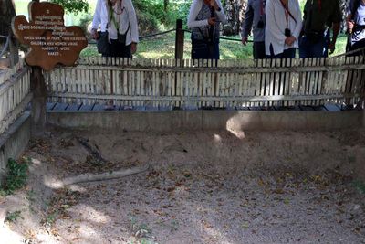 MASS GRAVE TO MORE THAN 100 WOMEN AND CHILDREN. MOST NAKED SUGGESTING RAPE