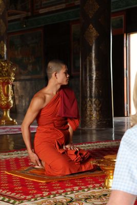 MONKS BLESS OUR GROUPS THEN THROW LOTUS BLOSSOMS ON US