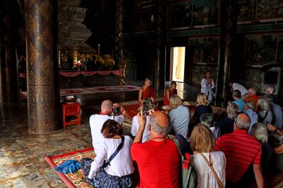 MONKS BLESS OUR GROUPS THEN THROW LOTUS BLOSSOMS ON US