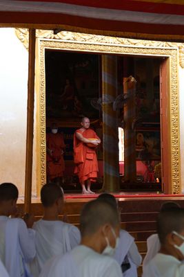 MONKS FEEDING THE ELDERLY AND DISABLED