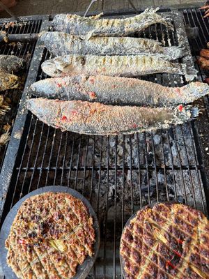 THE FISH ON THE GRILL WERE STILL ALIVE