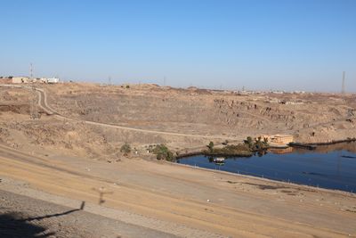 FOR SIZE PERSPECTIVE, NOTE THE PANEL ON THE LEFT SIDE OF THE DAM DISCHARGE.