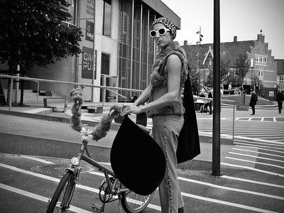 Lady with decorated bicycle