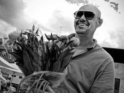 Smiling flower man