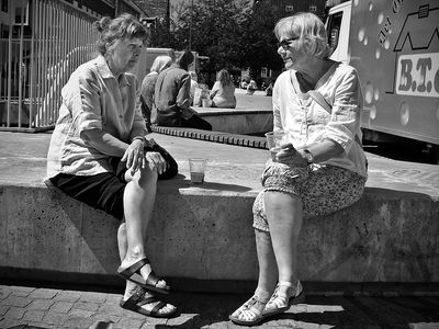 Friends chatting over a draft beer