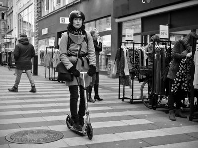 Lady on kick scooter