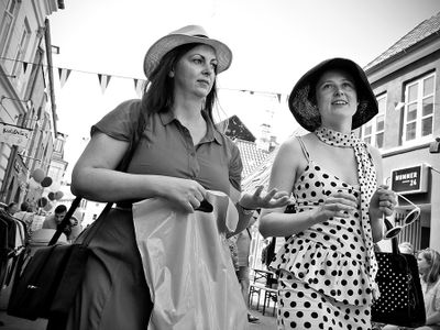 Two shopping hat ladies