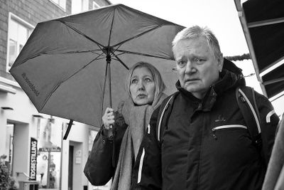 Shopping couple a rainy day