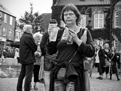 Hands full of refreshments