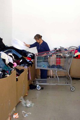 Digging in the clothes boxes.         IMG_3144.jpg